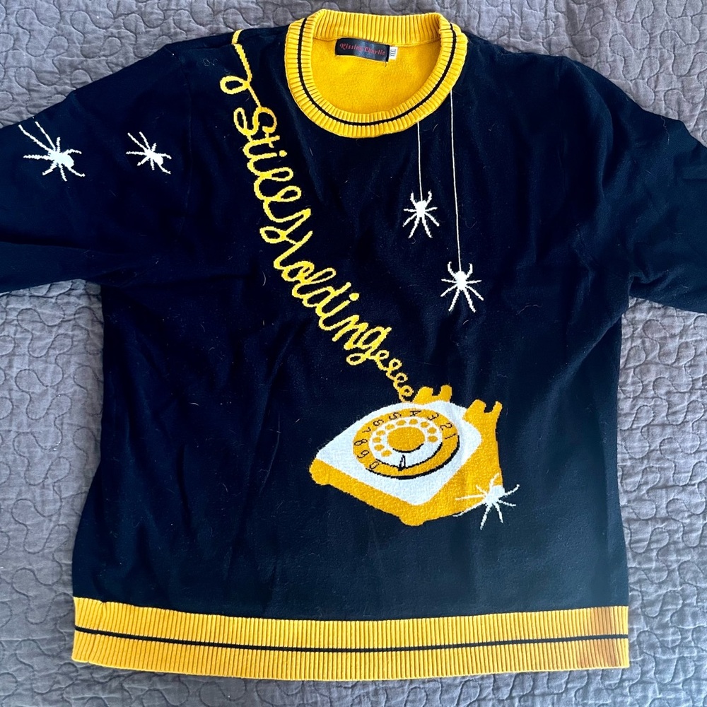Retro “Still Holding” Black and Yellow Graphic Sweater